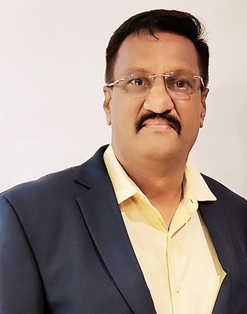 Mr. Milind Lotlikar